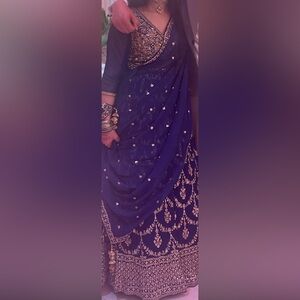 Selling this navy blue lehenga with golden detailings